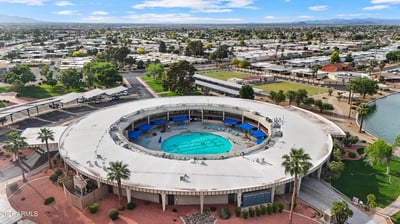 Enjoy access to the nearby Sun City community pool featuring shaded seating, spacious deck areas, and beautifully maintained recreational facilities designed for year-round enjoyment.