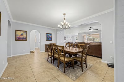 Enjoy a spacious dining area that flows naturally into the living room and kitchen, creating a bright, open environment perfect for everyday meals and entertaining guests.