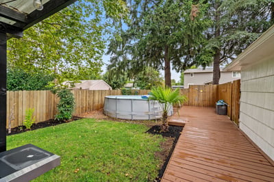 Deck and Fenced Backyard