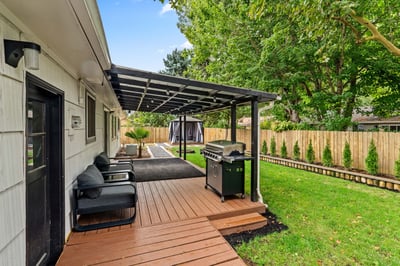 Covered Patio, Deck and Fenced Backyard