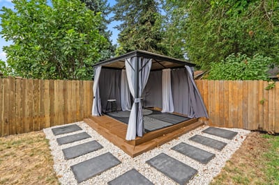 Raised Wooden Deck with Gazebo and Pathway
