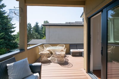 This partially covered deck allows for use of the space all year long.