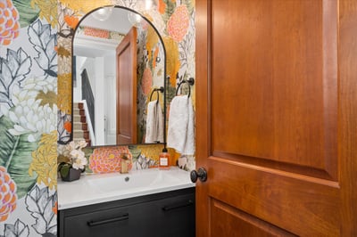 Captivating half bathroom on the main level.
