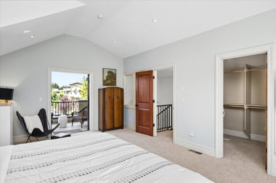 The primary suite is the only room located on the upper level.