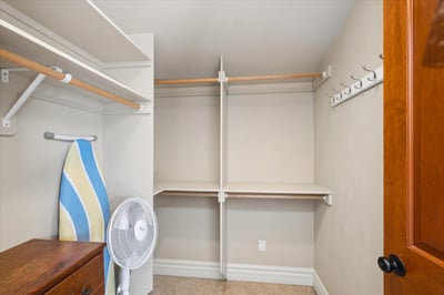 One of two walk-in closets in the primary suite.