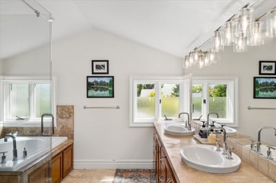 The spa-inspired bathroom is complete with a large rain fall shower and a jetted soaker tub for ultimate relaxation which will not disappoint.
