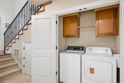 Lower level laundry space.