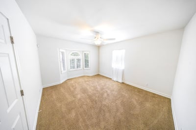 Front bedroom with custom plantation