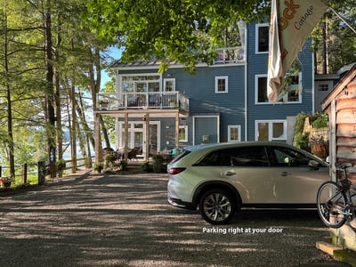Paved Driveway with level parking areas. Can park up to 12 cars!!
