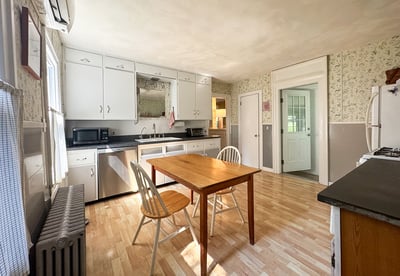 Kitchen opens to Sunroom