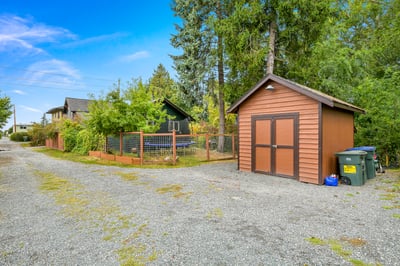 Detached shed and additional parking area