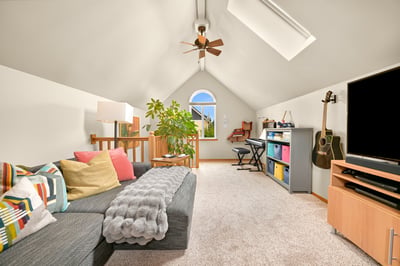 Incredibly versatile bonus room with it's own Samsung mini-split, vaulted ceilings, skylight, and deck!