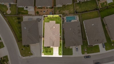 Spacious lot with well-maintained home, conveniently located near parks and local amenities for easy living.