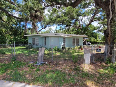This property features a spacious yard, desirable location, and potential for customization in a peaceful neighborhood.