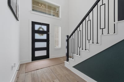 Light drenched, two story entry.
