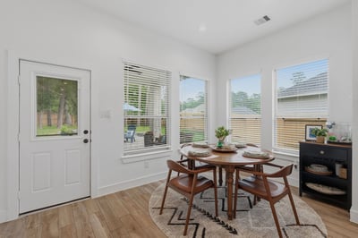 Lovely casual dining space overlooking the backyard.