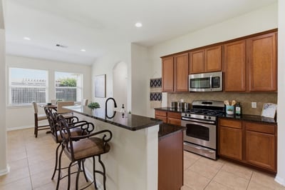 The kitchen provides ample storage and counter space.