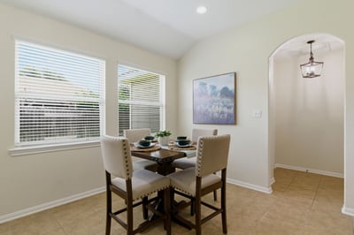 Casual dining area open to all the action in the kitchen and living room.