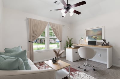 Secondary bedroom on the front of the house. Virtually staged as an office.