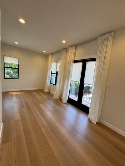 Primary Bedroom has French Doors leading to 3rd Balcony