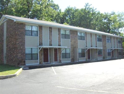 Well-maintained multi-family building offering spacious units and convenient parking in a prime location.