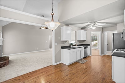 Bright open-concept kitchen seamlessly connects to spacious living areas, perfect for entertaining and daily living.