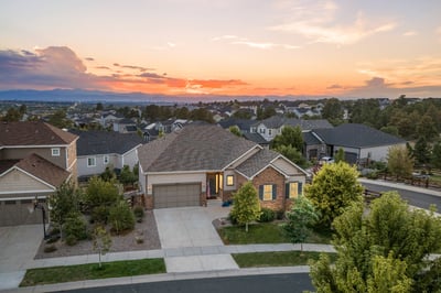 Discover this inviting home with panoramic sunset views, nestled in a vibrant community with lush landscaping.