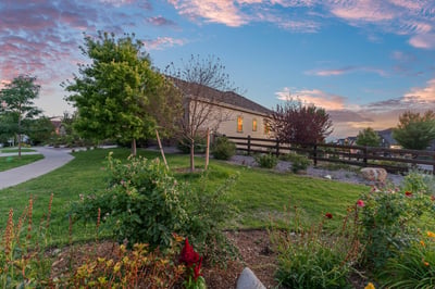 Discover this inviting home surrounded by vibrant gardens and picturesque views, perfect for outdoor enthusiasts.