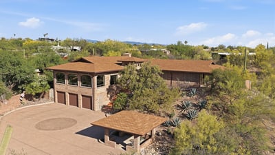 Spacious hillside home with unique architecture, expansive outdoor space, and stunning desert views.
