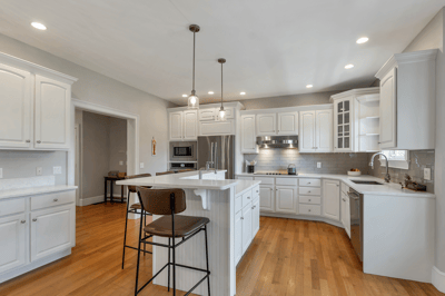 White Quartz, SS Appliances & Generous Cabinetry
