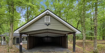 Spacious carport that offers ample parking and easy access to the home.