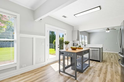 A kitchen island adds an extra countertop space for meal prep, baking, or entertaining.