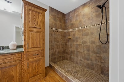 Spacious third bathroom on the main level. Incredible shower area