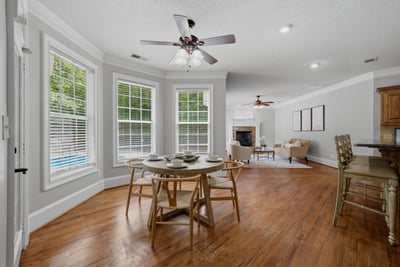 Eat-in kichen dining area and views of the inviting outdoor pool.