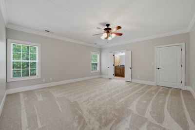 Additional ensuite bedroom on the main level.