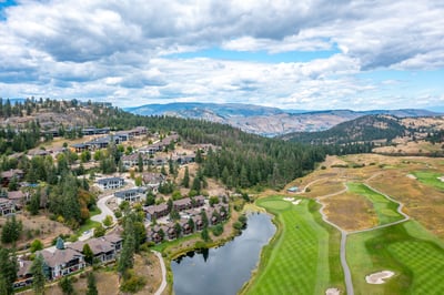 Discover this spacious property nestled among lush landscapes and a pristine golf course with breathtaking mountain views.
