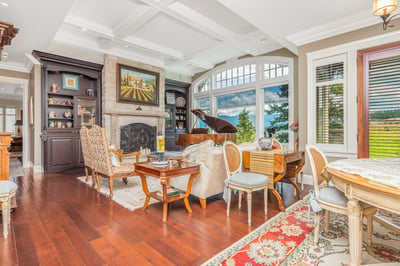 Spacious open-concept living area features abundant natural light, stunning lake views, and tasteful finishes throughout.