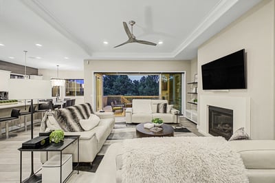 Bright and spacious living area with modern finishes, large windows, and seamless indoor-outdoor flow.