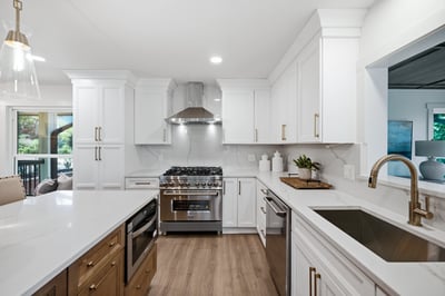 Modern kitchen featuring high-end appliances, ample counter space, and a seamless flow to outdoor living areas.