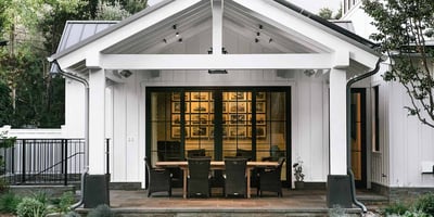 Experience elegant outdoor living in this beautifully designed home with a spacious dining patio.