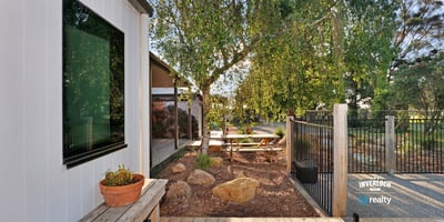 Modern outdoor space featuring a tranquil garden area, perfect for relaxation and entertaining.