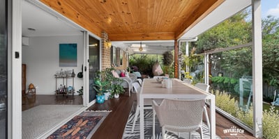 Experience effortless indoor-outdoor living with this spacious covered patio, perfect for gatherings and relaxation.
