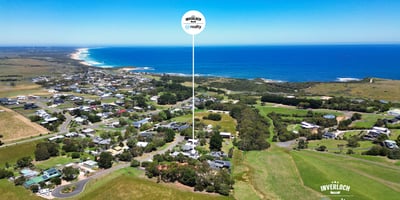 Stunning coastal property offering expansive views, proximity to the beach, and a vibrant community atmosphere.