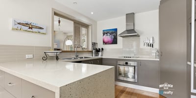 Modern kitchen featuring sleek cabinetry, ample counter space, and a seamless blend of functionality and design.