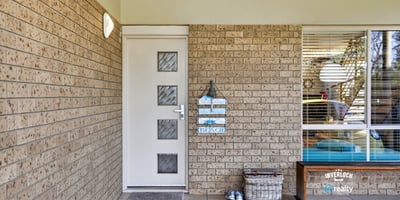 Welcoming entryway features modern design elements and inviting natural light for a warm first impression.