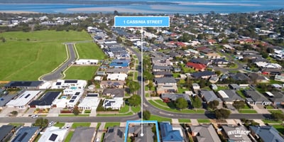 Expansive coastal lot in a developing neighborhood, offering stunning water views and convenient access to local amenities.