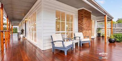 Spacious deck perfect for outdoor relaxation, featuring ample natural light and modern architectural details.