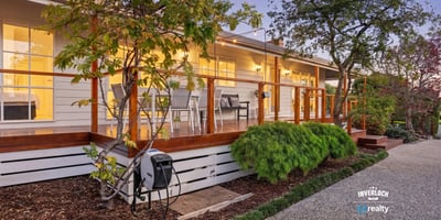Discover this inviting home featuring a spacious deck, landscaped gardens, and modern amenities throughout.