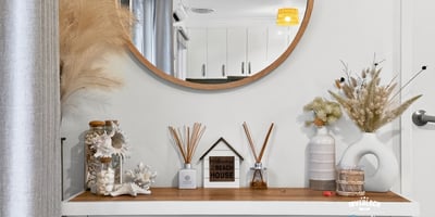 Discover a welcoming entryway featuring unique decor, creating an inviting atmosphere for every guest.