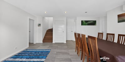 Spacious dining area features modern finishes, natural light, and a seamless flow to adjacent living spaces.